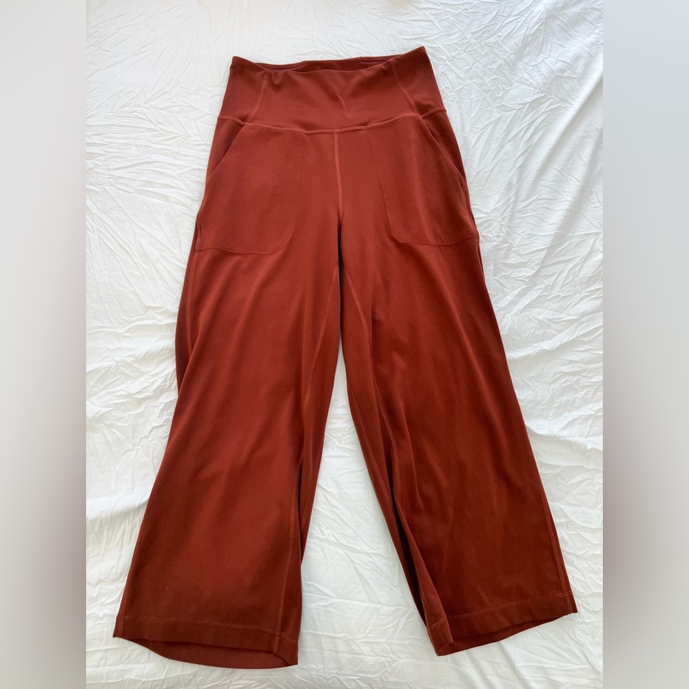 Like new burnt orange Lululemon Athletica size 4 capri